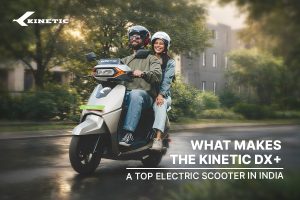 Kinetic DX+ top electric scooter riding on city roads, showcasing smart mobility and modern EV commuting in India.