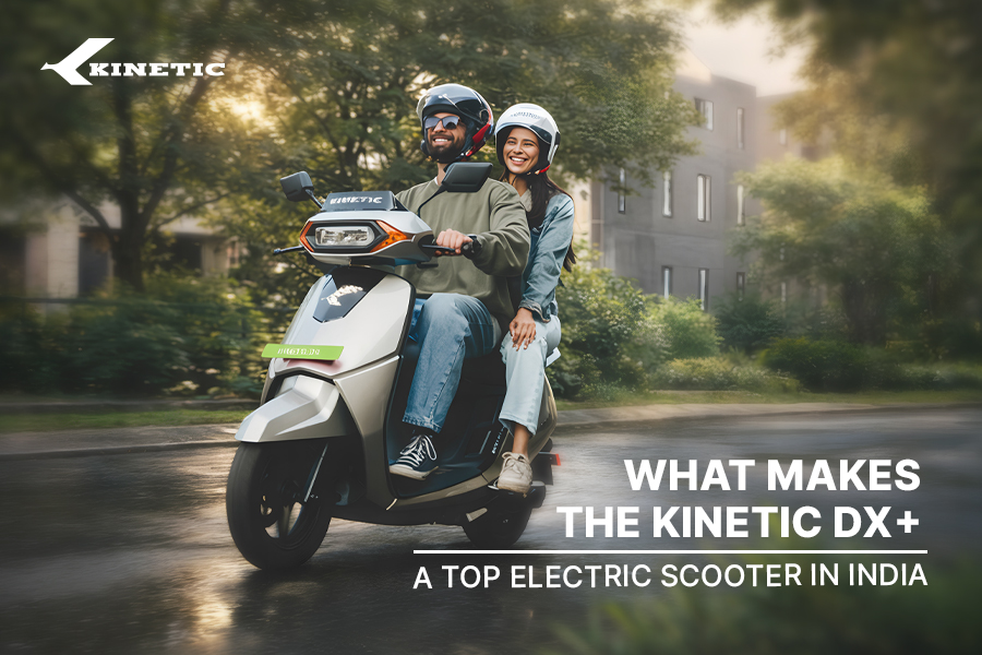 Kinetic DX+ top electric scooter riding on city roads, showcasing smart mobility and modern EV commuting in India.